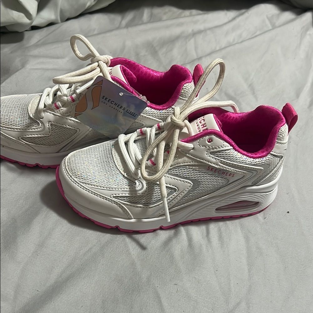 Skechers White Sneakers with Pink Highlights